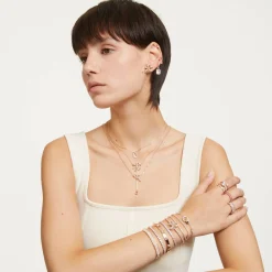 RE MATRIX:ARMBAND S WHITE/ROS M